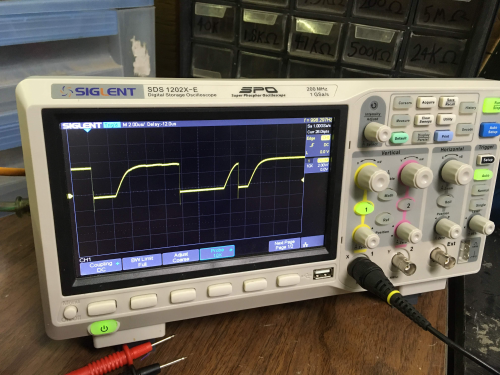 Voltage across R2 (emitter bias current)